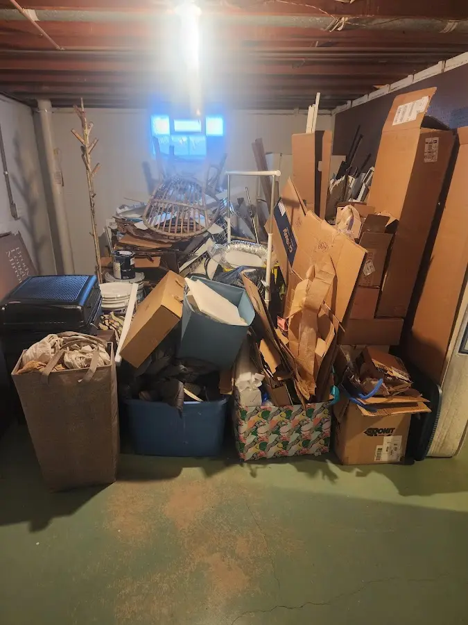 Roll-off dumpster container at job site for 2 Yard Dumpster Rental in Redlands